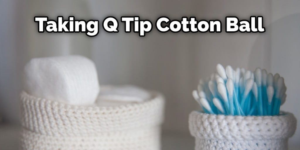 Taking Q Tip Cotton Ball